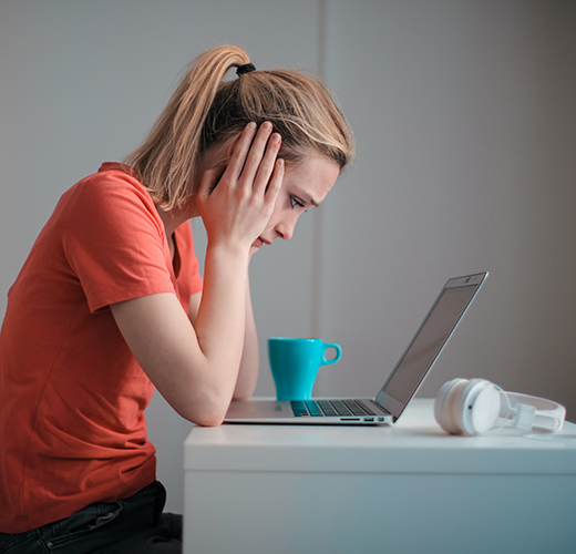Women on a computer learning about breast cancer diagnosis